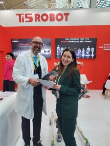 Dr. BotReburn with Ti5 Robot during the first live BotReburn Trust Verification demo at HANNOVER MESSE 2026.